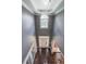 Grand foyer with soaring ceilings and an elegant chandelier at 2684 Mountain Oaks Ct, Powder Springs, GA 30127