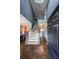 Grand foyer featuring hardwood floors, staircase and an open view of the home's interior at 2684 Mountain Oaks Ct, Powder Springs, GA 30127