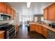 Bright kitchen with stainless steel appliances and a view of the breakfast nook at 2684 Mountain Oaks Ct, Powder Springs, GA 30127