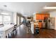 Open concept kitchen with stainless steel appliances and dark hardwood flooring at 2684 Mountain Oaks Ct, Powder Springs, GA 30127