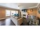 Cozy living room with fireplace, large windows, and comfortable seating, perfect for relaxation at 2684 Mountain Oaks Ct, Powder Springs, GA 30127