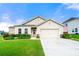 Charming single Gathering home with a well maintained lawn, two-car garage, and a beautifully landscaped garden at 3735 Westhaven Dr, Cumming, GA 30040