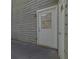 Exterior door with a half-window and paneled design, providing access to the backyard or patio area at 4520 Coopers Creek Se Cir, Smyrna, GA 30082