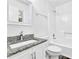 The bathroom features a tiled shower and a granite countertop vanity at 4520 Coopers Creek Se Cir, Smyrna, GA 30082