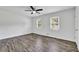 Bright and airy bedroom showcasing modern flooring, white walls, and natural light at 4520 Coopers Creek Se Cir, Smyrna, GA 30082
