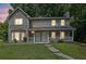 Charming two-story home featuring a welcoming front porch and well-maintained landscaping at 4520 Coopers Creek Se Cir, Smyrna, GA 30082