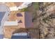 Aerial view showcasing the roof of a home, yard, and proximity to nearby houses at 4865 Fourth Rail Ln, Cumming, GA 30040
