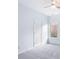 Bedroom with a window and plush gray carpet flooring at 4865 Fourth Rail Ln, Cumming, GA 30040
