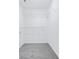 Walk-in closet with carpet, a door, and shelving at 4865 Fourth Rail Ln, Cumming, GA 30040
