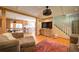 Cozy living room with wood trim, hardwood floors, and open floor plan at 1066 Sea Oats Sw Way, Lilburn, GA 30047