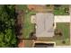 Aerial view showcases the home's layout with a spacious backyard and patio at 1810 Stardust Trl, Cumming, GA 30040