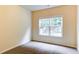 Bedroom with a window that allows for natural light at 1810 Stardust Trl, Cumming, GA 30040