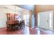 Elegant dining room with hardwood floors, natural light and a stylish chandelier at 1810 Stardust Trl, Cumming, GA 30040