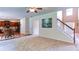 Open living room concept with fireplace and open floor plan to kitchen and entry at 1810 Stardust Trl, Cumming, GA 30040