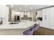 Kitchen featuring a large quartz island and modern stainless steel appliances at 2055 Beacon Hill Way, Alpharetta, GA 30005