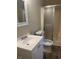 Bathroom features a vanity, toilet and shower with wood look flooring at 2475 Cajun Dr, Marietta, GA 30066