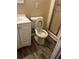 Cozy bathroom features a standard toilet, vanity with sink, and a shower stall, ensuring functionality at 2475 Cajun Dr, Marietta, GA 30066