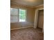 Comfortable bedroom with large windows, neutral walls, closet and carpeted flooring at 2475 Cajun Dr, Marietta, GA 30066