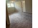 Bedroom with large window for natural light and neutral carpet at 2475 Cajun Dr, Marietta, GA 30066