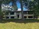 Charming home featuring a well-maintained front yard and classic architectural details at 2475 Cajun Dr, Marietta, GA 30066
