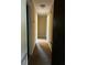 Neutral hallway featuring carpeted flooring and two access doors at 2475 Cajun Dr, Marietta, GA 30066
