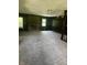 Open-concept living room with brick fireplace, neutral carpet, and dark trim at 2475 Cajun Dr, Marietta, GA 30066