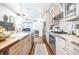 Spacious kitchen featuring stainless steel appliances, ample counter space, and modern fixtures at 401 Emory Ne Dr, Atlanta, GA 30307