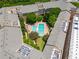 Aerial view showcasing community pools and manicured green spaces at Villa Sonoma at 10 Ne Perimeter Summit Blvd # 3107, Atlanta, GA 30319