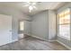 Bedroom features sliding closet doors and a large window with lots of natural light at 10 Ne Perimeter Summit Blvd # 3107, Atlanta, GA 30319