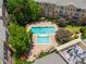 Overhead view of the sparkling community pools at Villa Sonoma, surrounded by trees at 10 Ne Perimeter Summit Blvd # 3107, Atlanta, GA 30319