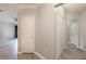 Hallway area with ample storage and neutral paint and flooring throughout the home at 10 Ne Perimeter Summit Blvd # 3107, Atlanta, GA 30319