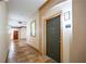 Hallway with neutral walls and decorative lighting leading to unit 3107 at 10 Ne Perimeter Summit Blvd # 3107, Atlanta, GA 30319