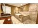 Upscale bathroom with a large soaking tub, tiled shower, and ample counter space for a relaxing retreat at 5300 Haynes Creek Dr, Loganville, GA 30052