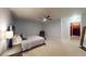 Large bedroom featuring neutral paint and carpet flooring at 5300 Haynes Creek Dr, Loganville, GA 30052