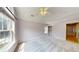 A room offering natural light, a fan, and closet space at 5300 Haynes Creek Dr, Loganville, GA 30052