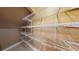 Attic closet with built-in wire shelving to maximize storage space at 5300 Haynes Creek Dr, Loganville, GA 30052