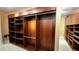 Custom closet with ample shelving and hanging space, offering stylish and functional storage solutions at 5300 Haynes Creek Dr, Loganville, GA 30052