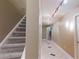 An inviting hallway with modern lighting at 5300 Haynes Creek Dr, Loganville, GA 30052