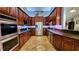 Spacious kitchen with stainless steel appliances and ample cabinet space at 5300 Haynes Creek Dr, Loganville, GA 30052