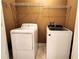 Laundry room with a washer and dryer set for ultimate convenience at 5300 Haynes Creek Dr, Loganville, GA 30052