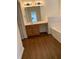 Bathroom features a large mirror, vanity, and adjacent bathtub at 1865 Ellison Lakes Nw Ct # 21, Kennesaw, GA 30152