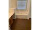 Clean bathroom with a soaking tub and updated vanity at 1865 Ellison Lakes Nw Ct # 21, Kennesaw, GA 30152