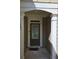 Welcoming front entrance with decorative columns and a secure front door at 1865 Ellison Lakes Nw Ct # 21, Kennesaw, GA 30152