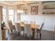 Elegant dining room featuring a chandelier, decorative ceiling, and ample seating space for gatherings at 3739 In Bloom Way, Auburn, GA 30011