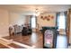 Spacious game room with seating, arcade games and wood floors at 3739 In Bloom Way, Auburn, GA 30011
