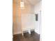 Charming mud room with coat rack, bench seating, and decorative elements at 3739 In Bloom Way, Auburn, GA 30011