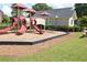 Community playground featuring slides and climbing structures, offering a fun recreational area at 3739 In Bloom Way, Auburn, GA 30011
