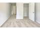 Bright bedroom with neutral carpet and a closet door at 3772 Sunbridge Dr, Snellville, GA 30039