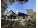 This home has a lovely backyard with a screened-in porch and patio, perfect for enjoying the outdoors at 3920 Knotts Pass Rd, Snellville, GA 30039