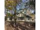 A charming home featuring a well maintained lawn and a screened-in porch, perfect for relaxation at 3920 Knotts Pass Rd, Snellville, GA 30039